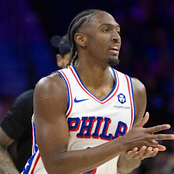 Feb 22, 2025; Philadelphia, Pennsylvania, USA; Philadelphia 76ers guard Tyrese Maxey (0) reacts to his three pointer against the Brooklyn Nets during the first quarter at Wells Fargo Center. Mandatory Credit: Bill Streicher-Imagn Images