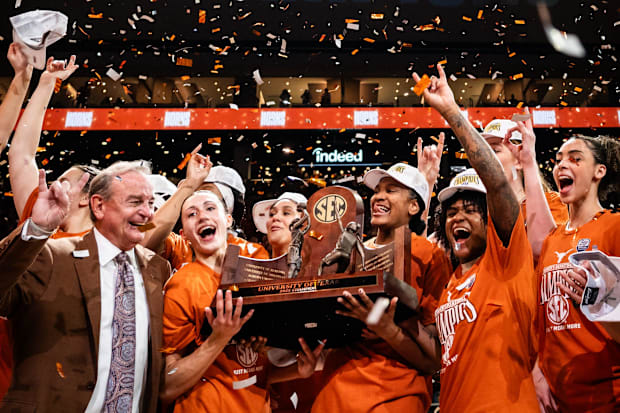 The Texas Longhorns celebrate winning the SEC regular season championshi