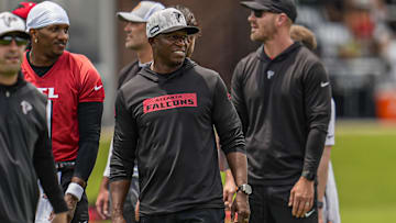 Jun 11, 2025; Atlanta, GA, USA; Atlanta Falcons head coach Raheem Morris reacts on the field during Minicamp at Children's Healthcare of Atlanta Training Ground. Mandatory Credit: Dale Zanine-Imagn Images