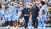 Nov 22, 2025; Chapel Hill, North Carolina, USA; North Carolina Tar Heels head coach Bill Belichick watches play during the first half against the Duke Blue Devils at Kenan Stadium. Mandatory Credit: William Howard-Imagn Images