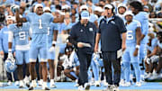 Nov 22, 2025; Chapel Hill, North Carolina, USA; North Carolina Tar Heels head coach Bill Belichick watches play during the first half against the Duke Blue Devils at Kenan Stadium. Mandatory Credit: William Howard-Imagn Images