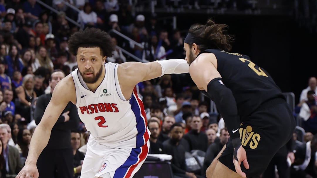 May 5, 2026; Detroit, Michigan, USA; Detroit Pistons guard Cade Cunningham (2) dribbles defended by Cleveland Cavaliers guard Max Strus (2) in the second half during game one of the second round of the 2026 NBA Playoffs at Little Caesars Arena. Mandatory Credit: Rick Osentoski-Imagn Images