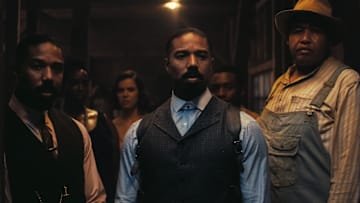 (L to r) MICHAEL B. JORDAN as Smoke, WUNMI MOSAKU as Annie, HAILEE STEINFELD as Mary, MICHAEL B. JORDAN as Stack, MILES CATON as Sammie and OMAR BENSON MILLER as Cornbread in Warner Bros. Pictures’ “SINNERS,” a Warner Bros. Pictures release.