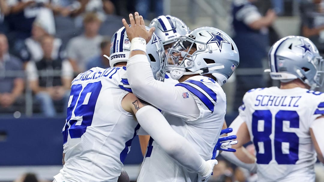 Oct 23, 2022; Arlington, Texas, USA; Dallas Cowboys quarterback Dak Prescott (4) celebrates with  tight end Peyton Hendershot (89) after a touchdown  during the fourth quarter against the Detroit Lions at AT&T Stadium. Mandatory Credit: Kevin Jairaj-Imagn Images