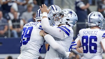 Oct 23, 2022; Arlington, Texas, USA; Dallas Cowboys quarterback Dak Prescott (4) celebrates with  tight end Peyton Hendershot (89) after a touchdown  during the fourth quarter against the Detroit Lions at AT&T Stadium. Mandatory Credit: Kevin Jairaj-Imagn Images