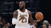 Nov 23, 2025; Salt Lake City, Utah, USA: Los Angeles Lakers forward LeBron James (23) looks for the play against the Utah Jazz during the second half at Delta Center. Mandatory Credit: Rob Gray-Imagn Images