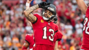 Dec 24, 2023; Tampa, Florida, USA; Tampa Bay Buccaneers wide receiver Mike Evans (13) celebrates the touchdown against the Jacksonville Jaguars in the second quarter at Raymond James Stadium. Mandatory Credit: Jeremy Reper-USA TODAY Sports