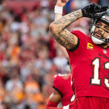 Dec 24, 2023; Tampa, Florida, USA; Tampa Bay Buccaneers wide receiver Mike Evans (13) celebrates the touchdown against the Jacksonville Jaguars in the second quarter at Raymond James Stadium. Mandatory Credit: Jeremy Reper-USA TODAY Sports