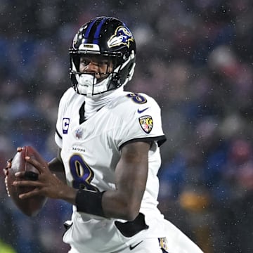 Jan 19, 2025; Orchard Park, New York, USA; Baltimore Ravens quarterback Lamar Jackson (8) looks to throw a pass in the fourth quarter of a 2025 AFC divisional round game against the Buffalo Bills at Highmark Stadium. Mandatory Credit: Mark Konezny-Imagn Images