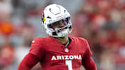 Aug 9, 2025; Glendale, Arizona, USA; Arizona Cardinals quarterback Kyler Murray (1) reacts after a yellow penalty flag is thrown against the Kansas City Chiefs during a preseason NFL game at State Farm Stadium. Mandatory Credit: Mark J. Rebilas-Imagn Images