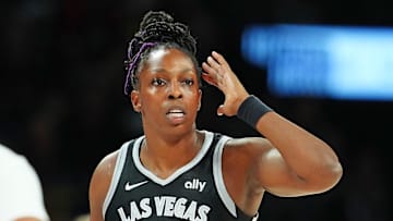 Sep 30, 2025; Las Vegas, Nevada, USA; Las Vegas Aces guard Chelsea Gray (12) calls a play against the Indiana Fever during the third quarter of game five of the second round of the 2025 WNBA Playoffs at Michelob Ultra Arena. Mandatory Credit: Stephen R. Sylvanie-Imagn Images