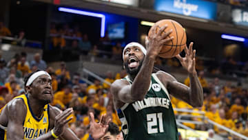 May 2, 2024; Indianapolis, Indiana, USA; Milwaukee Bucks guard Patrick Beverley (21) shoots the ball while Indiana Pacers forward Pascal Siakam (43) defends during game six of the first round for the 2024 NBA playoffs at Gainbridge Fieldhouse. Mandatory Credit: Trevor Ruszkowski-Imagn Images