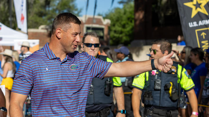Florida Head Coach Jon Sumrall greats fans as he heads to the locker room during Gator Walk before the Orange and Blue game at Steve Spurrier Field at Ben Hill Griffin Stadium in Gainesville, FL on Saturday, April 11, 2026. [Alan Youngblood/Gainesville Sun]
