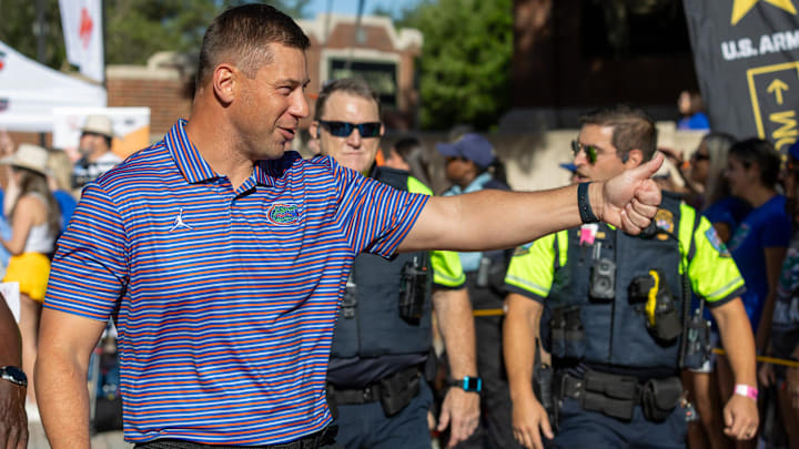 Florida Head Coach Jon Sumrall greats fans as he heads to the locker room during Gator Walk before the Orange and Blue game at Steve Spurrier Field at Ben Hill Griffin Stadium in Gainesville, FL on Saturday, April 11, 2026. [Alan Youngblood/Gainesville Sun]