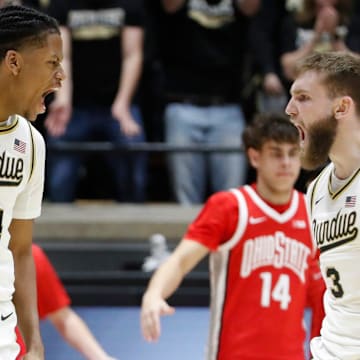 Purdue Boilermakers guard Gicarri Harris (24) celebrates with guard Braden Smith (3)