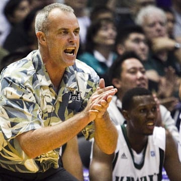 Hawaii coach Gib Arnold works the sideline. He will join the UW this season.