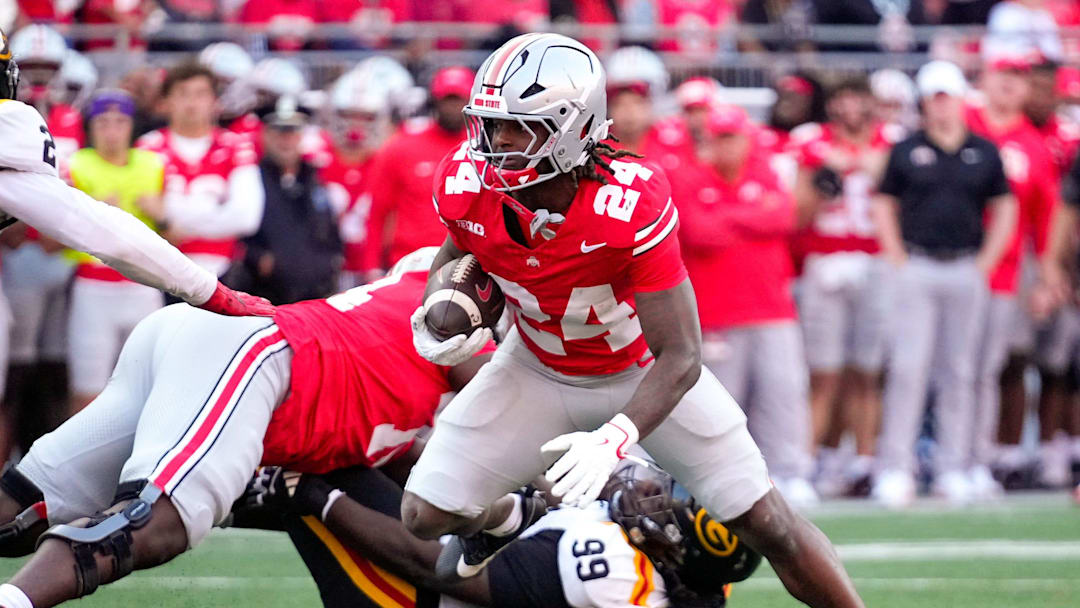 Ohio State Buckeyes running back Sam Dixon (24) runs the ball in the second half of the NCAA football game at the Ohio Stadium on Saturday, Sept. 6, 2025 in Columbus, Ohio.