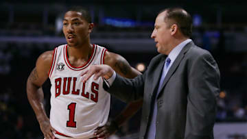 Oct 12, 2010; Chicago, IL, USA; Chicago Bulls point guard Derrick Rose (1) talks with head coach Tom Thibodeau during the first quarter of a preseason game against the Toronto Raptors at the United Center. Mandatory Credit: Jerry Lai-Imagn Images