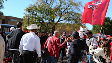 Nov 9, 2024; Lubbock, Texas, USA; Texas Tech Red Raiders head coach Joey McGuire greets fans before the game against the Colorado Buffalos at Jones AT&T Stadium and Cody Campbell Field. Mandatory Credit: Michael C. Johnson-Imagn Images