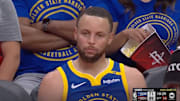Stephen Curry staring into space. 