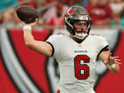 Aug 23, 2024; Tampa, Florida, USA;  Tampa Bay Buccaneer quarterback Baker Mayfield (6) throws the ball against the Miami Dolphins during the first quarter at Raymond James Stadium. Mandatory Credit: Kim Klement Neitzel-Imagn Images