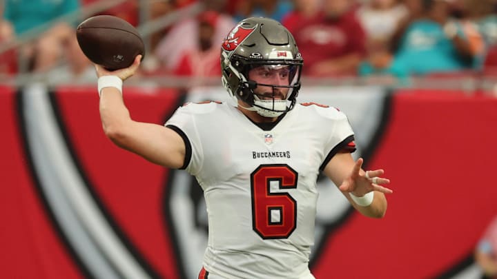 Aug 23, 2024; Tampa, Florida, USA;  Tampa Bay Buccaneer quarterback Baker Mayfield (6) throws the ball against the Miami Dolphins during the first quarter at Raymond James Stadium. Mandatory Credit: Kim Klement Neitzel-Imagn Images