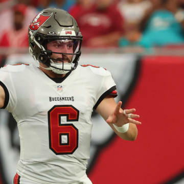 Aug 23, 2024; Tampa, Florida, USA;  Tampa Bay Buccaneer quarterback Baker Mayfield (6) throws the ball against the Miami Dolphins during the first quarter at Raymond James Stadium. Mandatory Credit: Kim Klement Neitzel-USA TODAY Sports