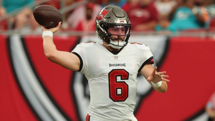 Aug 23, 2024; Tampa, Florida, USA;  Tampa Bay Buccaneer quarterback Baker Mayfield (6) throws the ball against the Miami Dolphins during the first quarter at Raymond James Stadium. Mandatory Credit: Kim Klement Neitzel-USA TODAY Sports