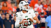 Aug 31, 2024; Syracuse, New York, USA; Ohio Bobcats quarterback Parker Navarro (13) drops back to pass against the Syracuse Orange during the second half at the JMA Wireless Dome. Mandatory Credit: Rich Barnes-Imagn Images