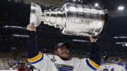 St. Louis Blues center Ivan Barbashev hoists the Stanley Cup after defeating the Boston Bruins in game seven of the 2019 Stanley Cup Final at TD Garden.