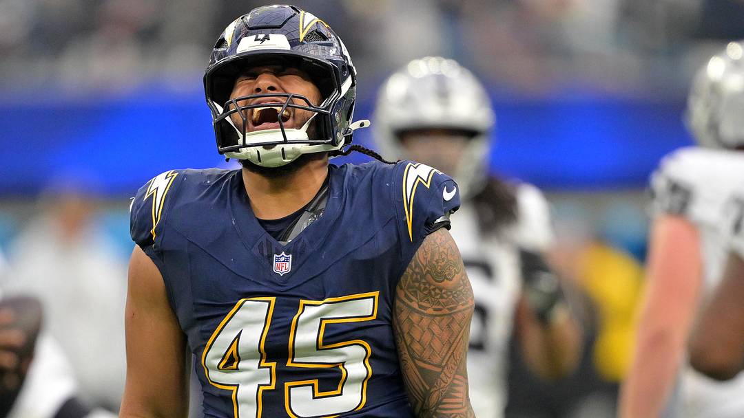 Nov 30, 2025; Inglewood, California, USA; Los Angeles Chargers linebacker Tuli Tuipulotu (45) reacts after a sack against the Las Vegas Raiders during the second half at SoFi Stadium. Mandatory Credit: Jayne Kamin-Oncea-Imagn Images