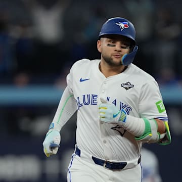 Nov 1, 2025; Toronto, Ontario, CAN; Toronto Blue Jays shortstop Bo Bichette (11) rounds the bases after hitting a three run home run against the Los Angeles Dodgers in the third inning for game seven of the 2025 MLB World Series at Rogers Centre. Mandatory Credit: Nick Turchiaro-Imagn Images