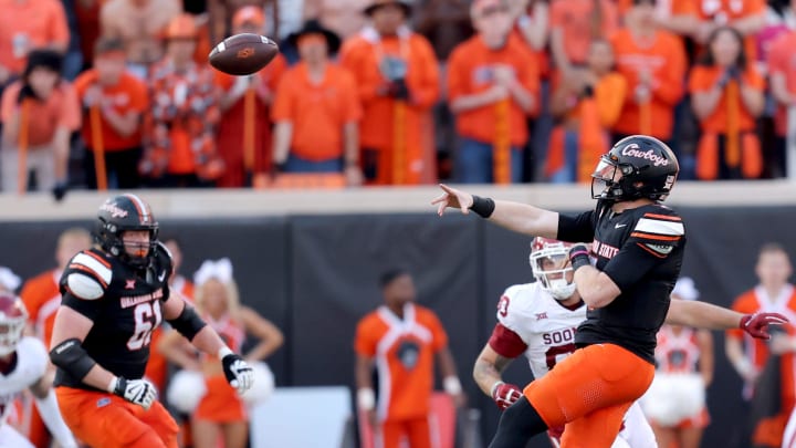 Oklahoma State's Alan Bowman (7) throws a pass in the second half during a Bedlam college football game between the Oklahoma State University Cowboys (OSU) and the University of Oklahoma Sooners (OU) at Boone Pickens Stadium in Stillwater, Okla., Saturday, Nov. 4, 2023.