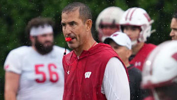 Wisconsin football head coach Luke Fickell observes practice, July 30, 2025, at Ralph E. Davis Pioneer Stadium in Platteville, Wisconsin.