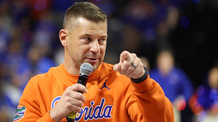 New Gator head football coach Jon Sumrall fires up the crowd during the first half an NCAA basketball game at Steven C. O'Connell Center Exactek arena in Gainesville, FL on Saturday, January 24, 2026. Auburn won 76-67 [Alan Youngblood/Gainesville Sun]