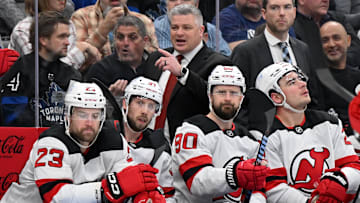 Jan 16, 2025; Toronto, Ontario, CAN;  New Jersey Devils head coach Sheldon Keefe gestures as he speaks to his players in the first period against the Toronto Maple Leafs at Scotiabank Arena. Mandatory Credit: Dan Hamilton-Imagn Images