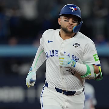 Nov 1, 2025; Toronto, Ontario, CAN; Toronto Blue Jays shortstop Bo Bichette (11) rounds the bases after hitting a three run home run against the Los Angeles Dodgers in the third inning for game seven of the 2025 MLB World Series at Rogers Centre. Mandatory Credit: Nick Turchiaro-Imagn Images