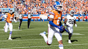 October 6, 2024, Denver, Colorado, USA: Broncos CB PAT SURTAIN II run down the sideline for a 100 yard TD after an interception in the end zone during the 1st. Half at Empower Field at Mile High Sunday afternoon. The Broncos beat the Raiders 34-18. 