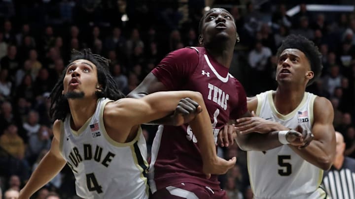 Purdue Boilermakers forward Trey Kaufman-Renn and guard Myles Colvin box out Texas Southern Tigers forward Kenny Hunter