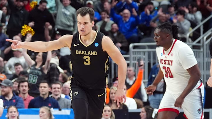 Mar 23, 2024; Pittsburgh, PA, USA; Oakland Golden Grizzlies guard Jack Gohlke (3) celebrates after making a three point during the first half of the game against the North Carolina State Wolfpack in the second round of the 2024 NCAA Tournament at PPG Paints Arena. Mandatory Credit: Gregory Fisher-Imagn Images