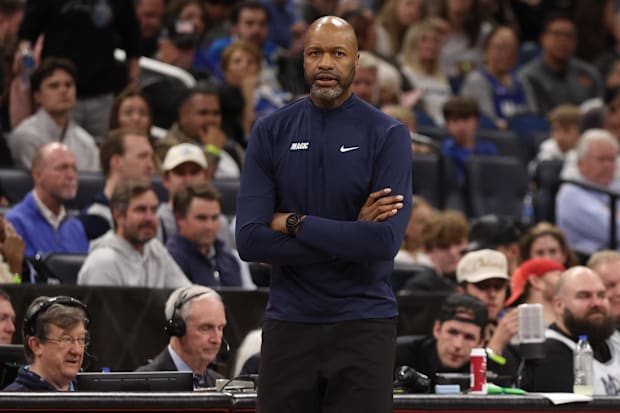 Orlando Magic head coach Jamahl Mosley directs his team against the Denver Nuggets