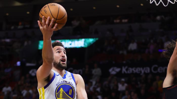 Mar 26, 2024; Miami, Florida, USA; Golden State Warriors guard Klay Thompson (11) drives to the