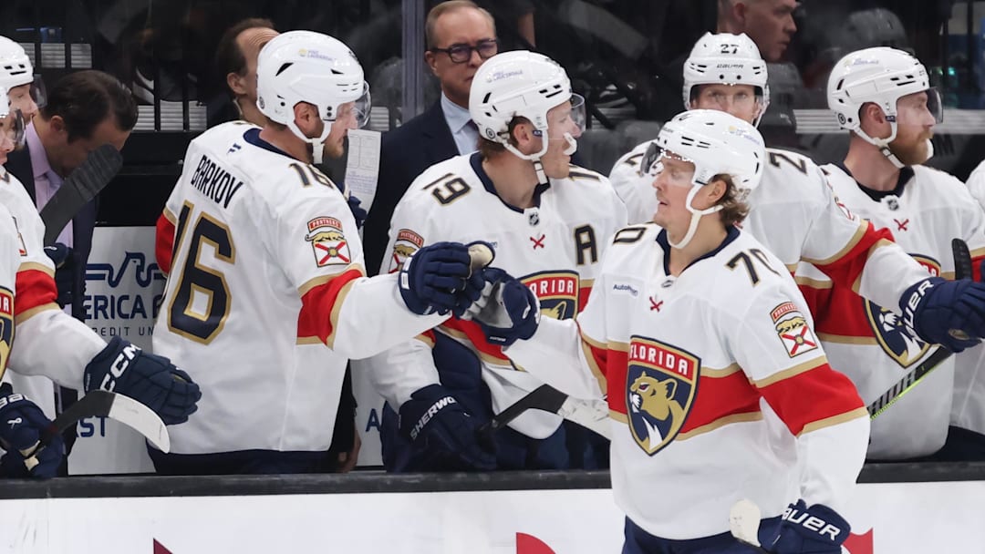 Jan 8, 2025; Salt Lake City, Utah, USA; Florida Panthers center Jesper Boqvist (70) celebrates with teammates an open net goal against the Utah Hockey Club during the third period at Delta Center. Mandatory Credit: Rob Gray-Imagn Images