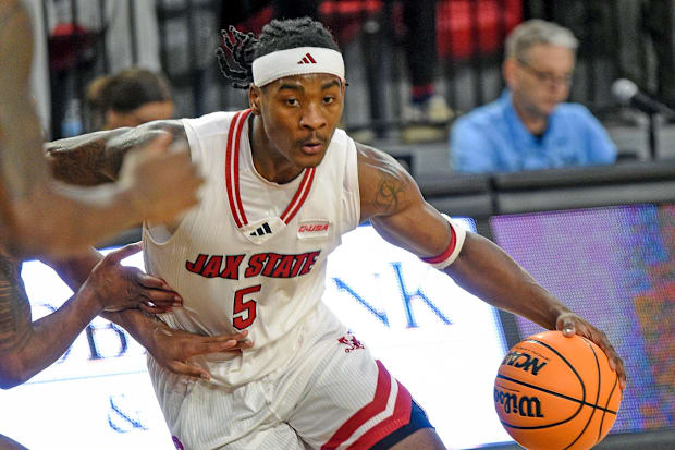 Pierre drives to the basket against New Mexico State in February.
