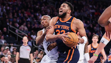 Mar 25, 2025; New York, New York, USA;  New York Knicks center Karl-Anthony Towns (32) drives past Dallas Mavericks forward Kai Jones (23) in the first quarter at Madison Square Garden. Mandatory Credit: Wendell Cruz-Imagn Images