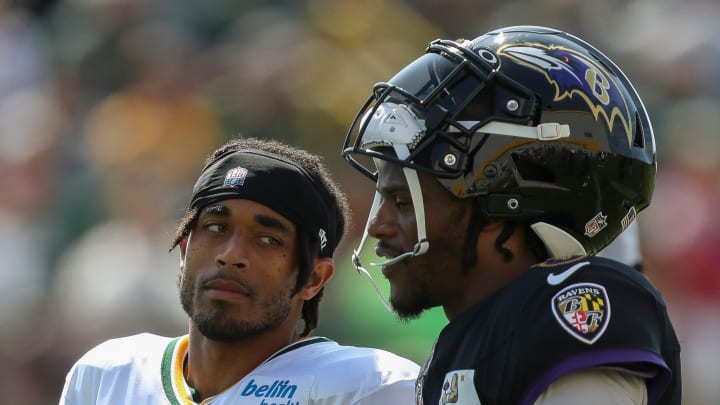 Green Bay Packers cornerback Jaire Alexander (23) talks with Baltimore Ravens quarterback and former University of Louisville teammate Lamar Jackson (8) during a joint practice on Thursday, August 22, 2024, at Ray Nitschke Field in Ashwaubenon, Wis. Tork Mason/USA TODAY NETWORK-Wisconsin