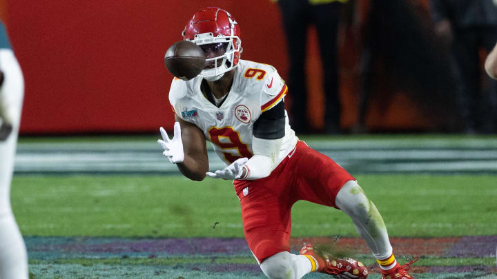 Feb 12, 2023; Glendale, Arizona, US; Kansas City Chiefs wide receiver JuJu Smith-Schuster (9) catches the ball against the Philadelphia Eagles at Super Bowl LVII at State Farm Stadium. Mandatory Credit: Bill Streicher-USA TODAY Sports