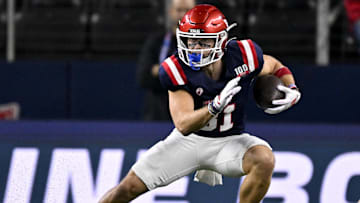 Jan 30, 2025; Arlington, TX, USA; East wide receiver Efton Chism of Eastern Washington (81) runs with the ball during the first half against the West at AT&T Stadium. Mandatory Credit: Jerome Miron-Imagn Images