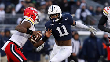 Nov 30, 2024; University Park, Pennsylvania, USA; (Editors Notes: Caption Correction) Penn State Nittany Lions defensive end Abdul Carter (11) pressures Maryland Terrapins quarterback MJ Morris (7) during the first quarter at Beaver Stadium. Mandatory Credit: Matthew O'Haren-Imagn Images