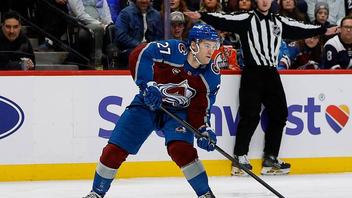 Jan 16, 2025; Denver, Colorado, USA; Colorado Avalanche left wing Jonathan Drouin (27) controls the puck in the second period against the Edmonton Oilers at Ball Arena. Mandatory Credit: Isaiah J. Downing-Imagn Images